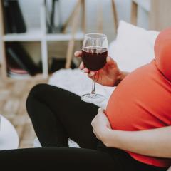Pregnant lady with wine
