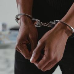 Hands in handcuffs
